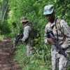 Soldados das forças especiais de Belize fazem patrulha na fronteira com a Guatemala